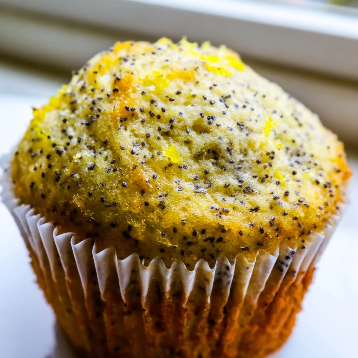Fresh lemon poppy seed muffins bursting with bright citrus zest and tender crumb
