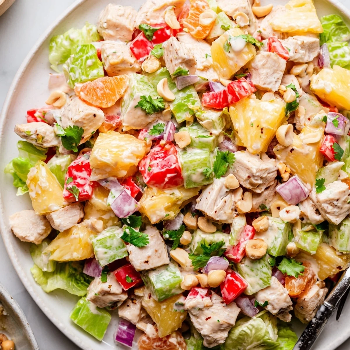 Grilled chicken and pineapple textures in Hawaiian Chicken Salad Recipe, creamy lime dressing.